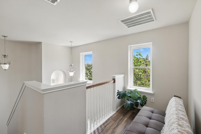1900 Cassandra Ct, Fort Worth, TX 76131 - corridor featuring an upstairs landing and wood finished floors