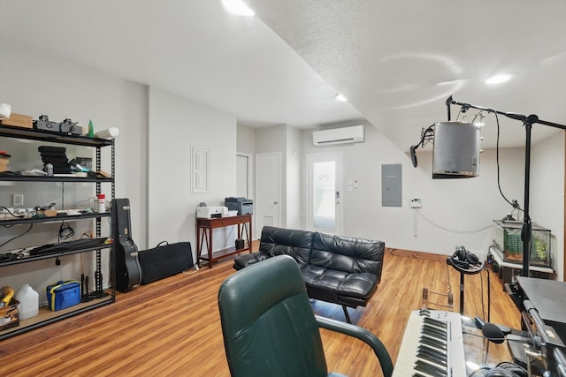 1900 Cassandra Ct, Fort Worth, TX 76131 - office space featuring a wall unit AC, electric panel, wood finished floors, and baseboards