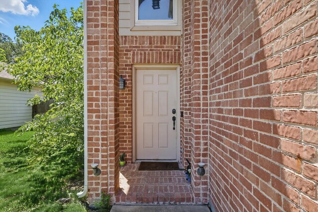 1900 Cassandra Ct, Fort Worth, TX 76131 - view of exterior entry featuring brick siding