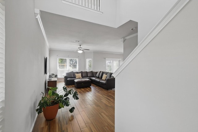 1900 Cassandra Ct, Fort Worth, TX 76131 - living area featuring ornamental molding, ceiling fan, dark wood-style flooring, and baseboards