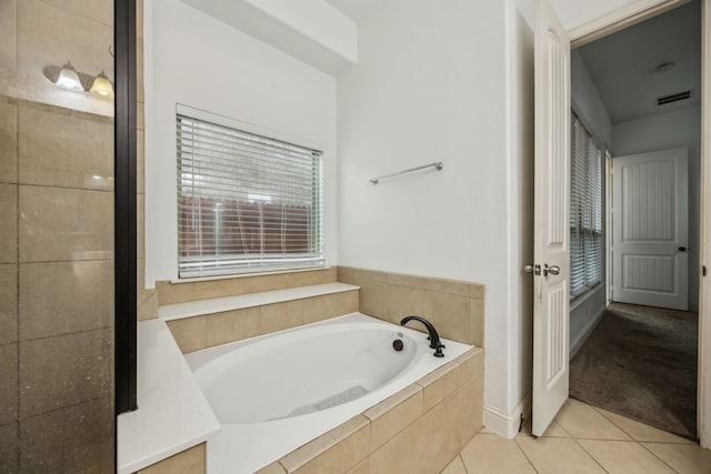 5005 Dominion Blvd, Irving, TX 75038 - full bath with a garden tub and tile patterned floors
