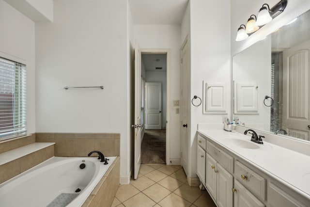 5005 Dominion Blvd, Irving, TX 75038 - full bath featuring vanity, a bath, and tile patterned floors