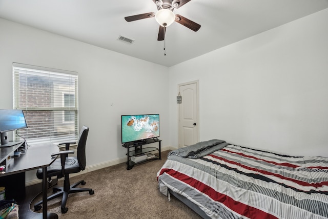 5005 Dominion Blvd, Irving, TX 75038 - carpeted bedroom with a desk, baseboards, and ceiling fan