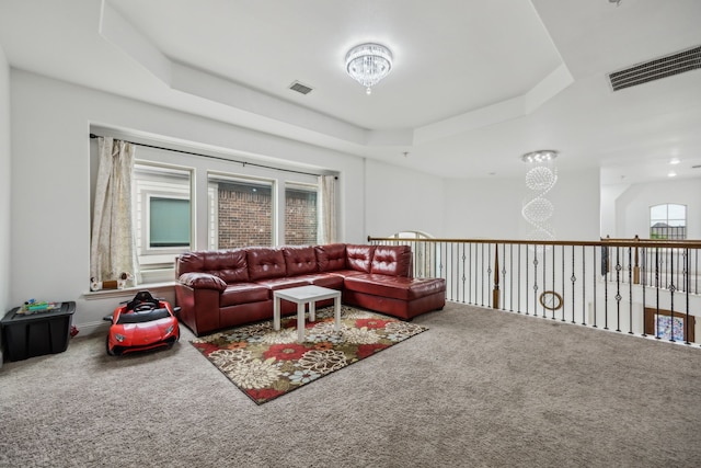 5005 Dominion Blvd, Irving, TX 75038 - living room featuring carpet floors and a raised ceiling