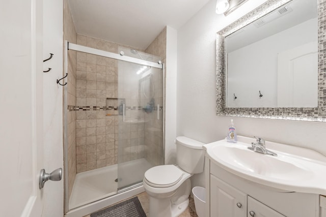 300 E Shoemaker St, Decatur, TX 76234 - full bathroom featuring vanity, a stall shower, and toilet