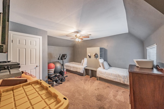 300 E Shoemaker St, Decatur, TX 76234 - carpeted bedroom featuring vaulted ceiling and ceiling fan