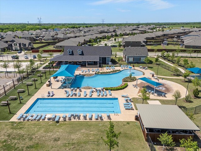 1042 Watercourse Pl, Royse City, TX 75189 - aerial perspective of suburban area with a pool area