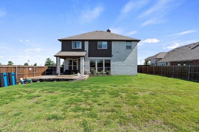1042 Watercourse Pl, Royse City, TX 75189 - rear view of house featuring a patio, brick siding, and a chimney