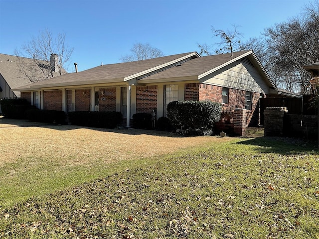 2420 Fairview Dr, Plano, TX 75075 - view of front of property featuring brick siding, a front lawn, and a chimney