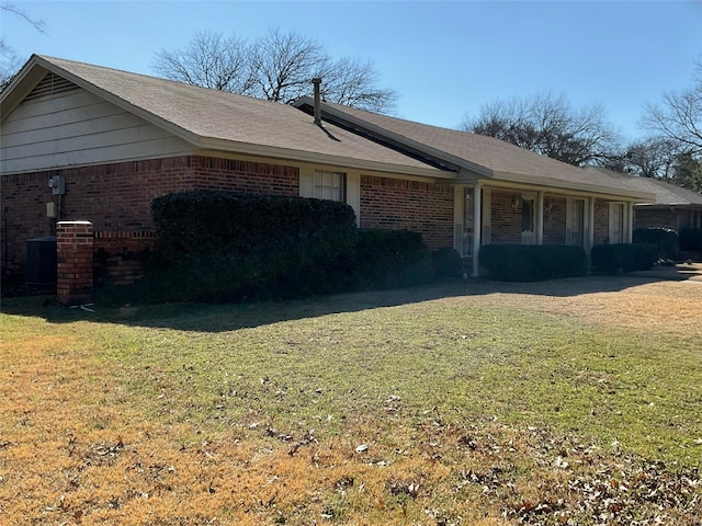 2420 Fairview Dr, Plano, TX 75075 - view of side of property with brick siding and a lawn