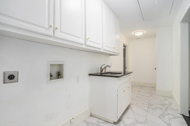 9112 Westwood Shores Dr, Fort Worth, TX 76179 - laundry room featuring hookup for an electric dryer, light marble finish floors, baseboards, and washer hookup