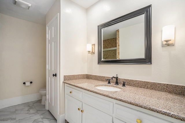 9112 Westwood Shores Dr, Fort Worth, TX 76179 - bathroom featuring vanity, toilet, marble look tiles, and baseboards