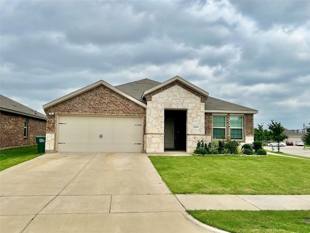 1013 Euston St, Denton, TX 76209 - view of front of house featuring driveway, a front yard, a garage, stone siding, and brick siding