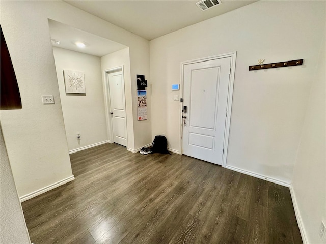 1013 Euston St, Denton, TX 76209 - foyer featuring wood finished floors and baseboards