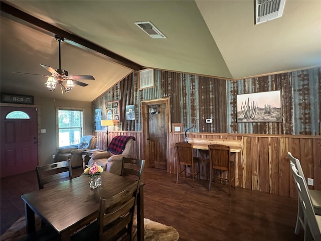 285 NE 5th St, Bogata, TX 75417 - dining space featuring ceiling fan, wood finished floors, and wood walls