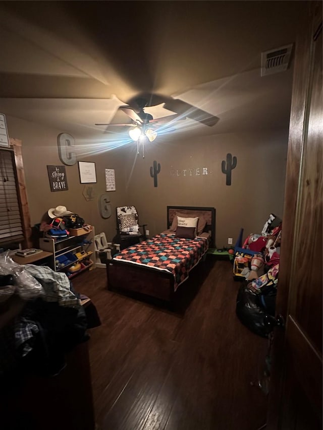 285 NE 5th St, Bogata, TX 75417 - bedroom with wood finished floors and ceiling fan