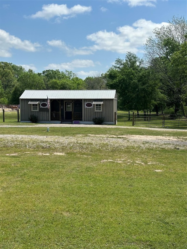 285 NE 5th St, Bogata, TX 75417 - view of front of property with board and batten siding