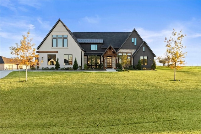3417 Dovehill Dr, Northlake, TX 76247 - view of front of home featuring a standing seam roof, a front yard, and metal roof