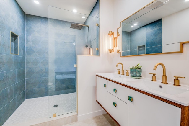 130 Holland Dr, Denison, TX 75020 - full bathroom featuring a walk in shower, double vanity, and recessed lighting