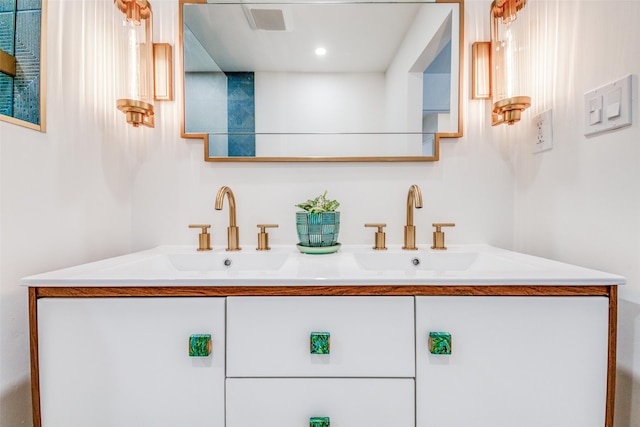 130 Holland Dr, Denison, TX 75020 - bathroom with double vanity and recessed lighting