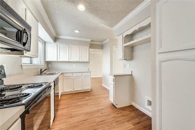 3610 Peakview Dr, Corinth, TX 76210 - kitchen featuring electric range, stainless steel microwave, a sink, a textured ceiling, and ornamental molding