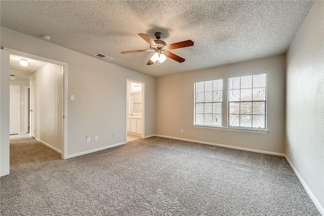 3610 Peakview Dr, Corinth, TX 76210 - spare room with ceiling fan, carpet flooring, a textured ceiling, a smoke detector, and baseboards