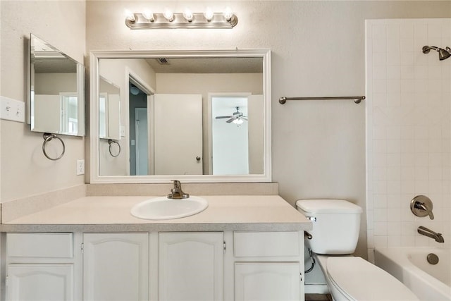 3610 Peakview Dr, Corinth, TX 76210 - bathroom featuring toilet, vanity, shower / bath combination, and ceiling fan