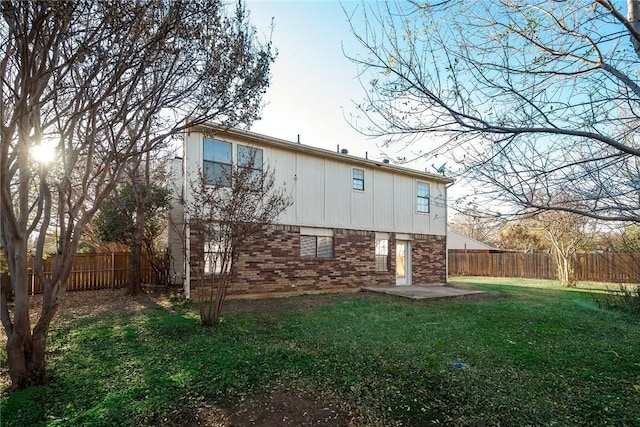 3610 Peakview Dr, Corinth, TX 76210 - back of house featuring brick siding and a patio area
