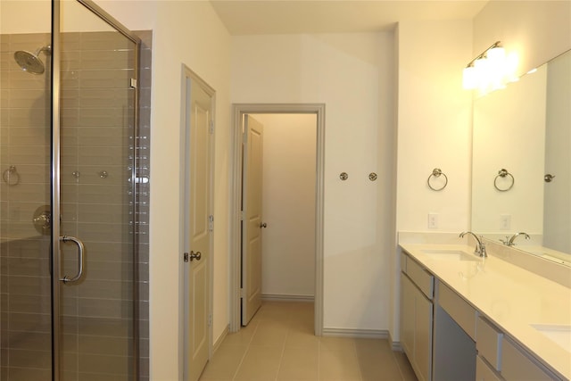 2538 Settlers Pl, Garland, TX 75042 - bathroom with tile patterned flooring, double vanity, a stall shower, and baseboards