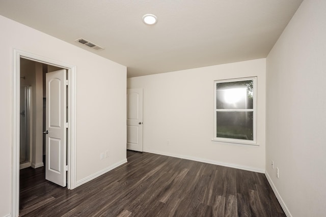 2829 Oakdale St, Dallas, TX 75215 - unfurnished room with dark wood-style floors and baseboards