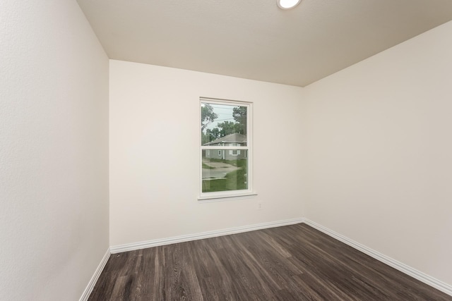 2829 Oakdale St, Dallas, TX 75215 - spare room featuring dark wood-type flooring and baseboards