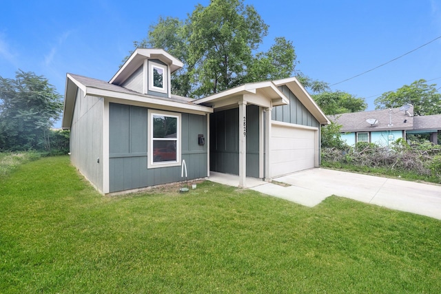 2829 Oakdale St, Dallas, TX 75215 - ranch-style home with a front yard, board and batten siding, and driveway