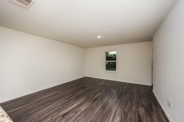 2829 Oakdale St, Dallas, TX 75215 - spare room featuring dark wood-style floors, baseboards, and recessed lighting