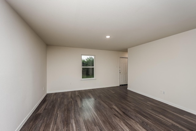 2829 Oakdale St, Dallas, TX 75215 - spare room featuring dark wood-type flooring, baseboards, and recessed lighting