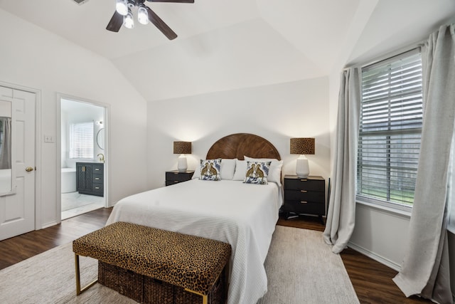 10119 Andre Dr, Irving, TX 75063 - bedroom with lofted ceiling, wood finished floors, ceiling fan, connected bathroom, and baseboards