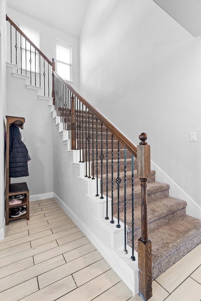 1417 Stoneleigh Pl, Aubrey, TX 76227 - stairway featuring baseboards and a high ceiling