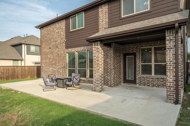 1417 Stoneleigh Pl, Aubrey, TX 76227 - back of house with a patio, brick siding, and a shingled roof