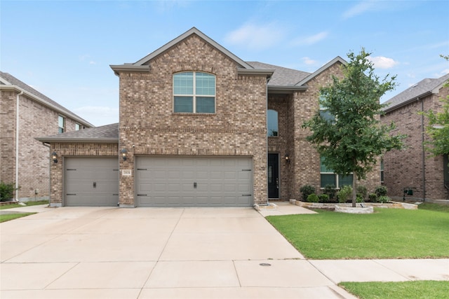 1616 Berry Ridge Trl, Aubrey, TX 76227 - traditional-style home with a front yard, driveway, brick siding, and a shingled roof