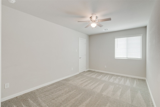 1616 Berry Ridge Trl, Aubrey, TX 76227 - unfurnished room with light colored carpet, a ceiling fan, and baseboards