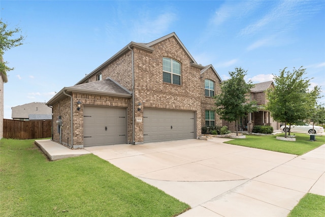 1616 Berry Ridge Trl, Aubrey, TX 76227 - traditional-style house with driveway, brick siding, and an attached garage