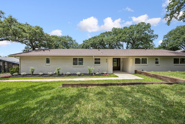 37 Devonshire Dr, Bedford, TX 76021 - single story home with brick siding, a front yard, and a patio area