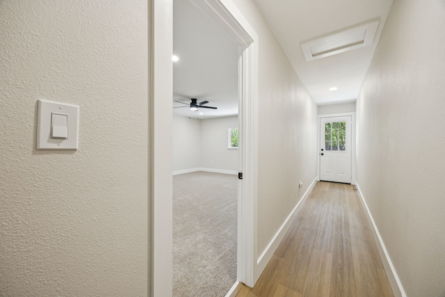 37 Devonshire Dr, Bedford, TX 76021 - hallway featuring attic access, baseboards, healthy amount of natural light, light wood finished floors, and recessed lighting