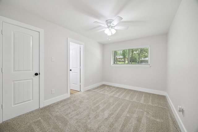 37 Devonshire Dr, Bedford, TX 76021 - unfurnished bedroom featuring carpet, baseboards, and a ceiling fan