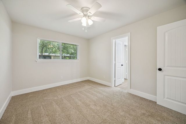 37 Devonshire Dr, Bedford, TX 76021 - unfurnished bedroom featuring carpet flooring, baseboards, and a ceiling fan