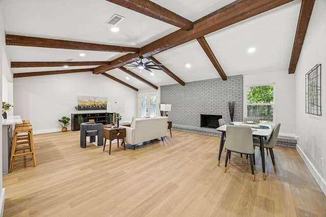 37 Devonshire Dr, Bedford, TX 76021 - dining room featuring ceiling fan, light wood-style floors, a brick fireplace, baseboards, and recessed lighting