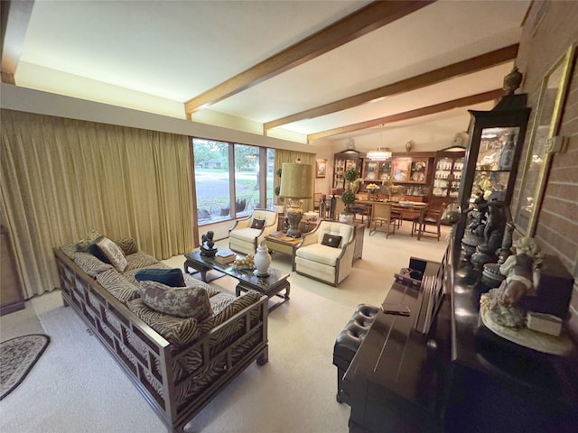 905 Bennett Dr, Bowie, TX 76230 - carpeted living room featuring beamed ceiling