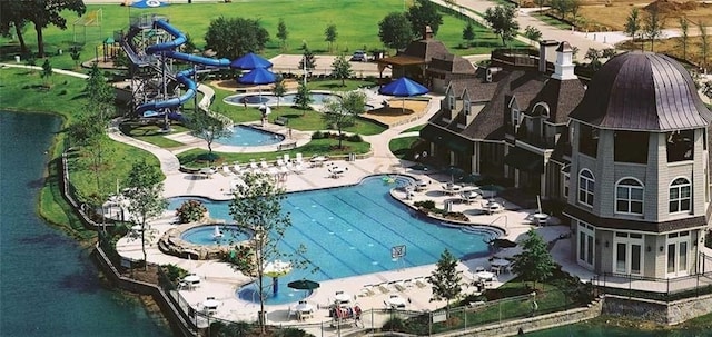 1461 Bristol Ln, Providence Village, TX 76227 - aerial view of a pool area and a nearby body of water