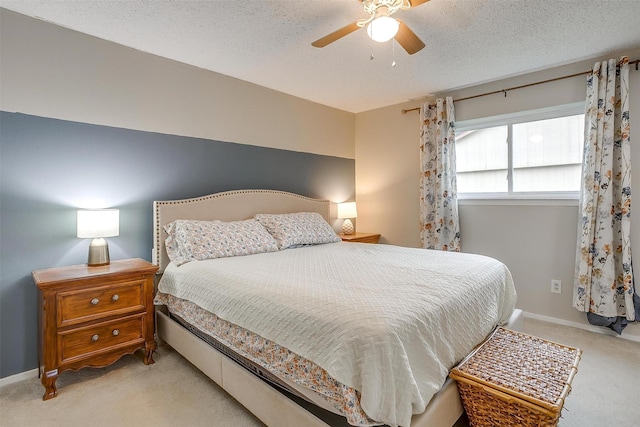 423 Parkview Dr, Burleson, TX 76028 - bedroom featuring carpet flooring, baseboards, a ceiling fan, and a textured ceiling