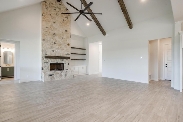 823 Wind River Pass, Azle, TX 76020 - unfurnished living room featuring high vaulted ceiling, a ceiling fan, a fireplace, baseboards, and beam ceiling