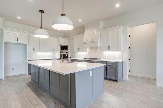 823 Wind River Pass, Azle, TX 76020 - kitchen featuring a sink, stainless steel gas cooktop, gray cabinetry, light countertops, and decorative backsplash